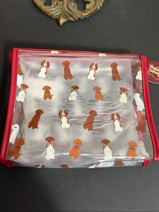 Anthropologie Handbags - Anthropologie Frasier Sterling clear bag with doggie bow ties design